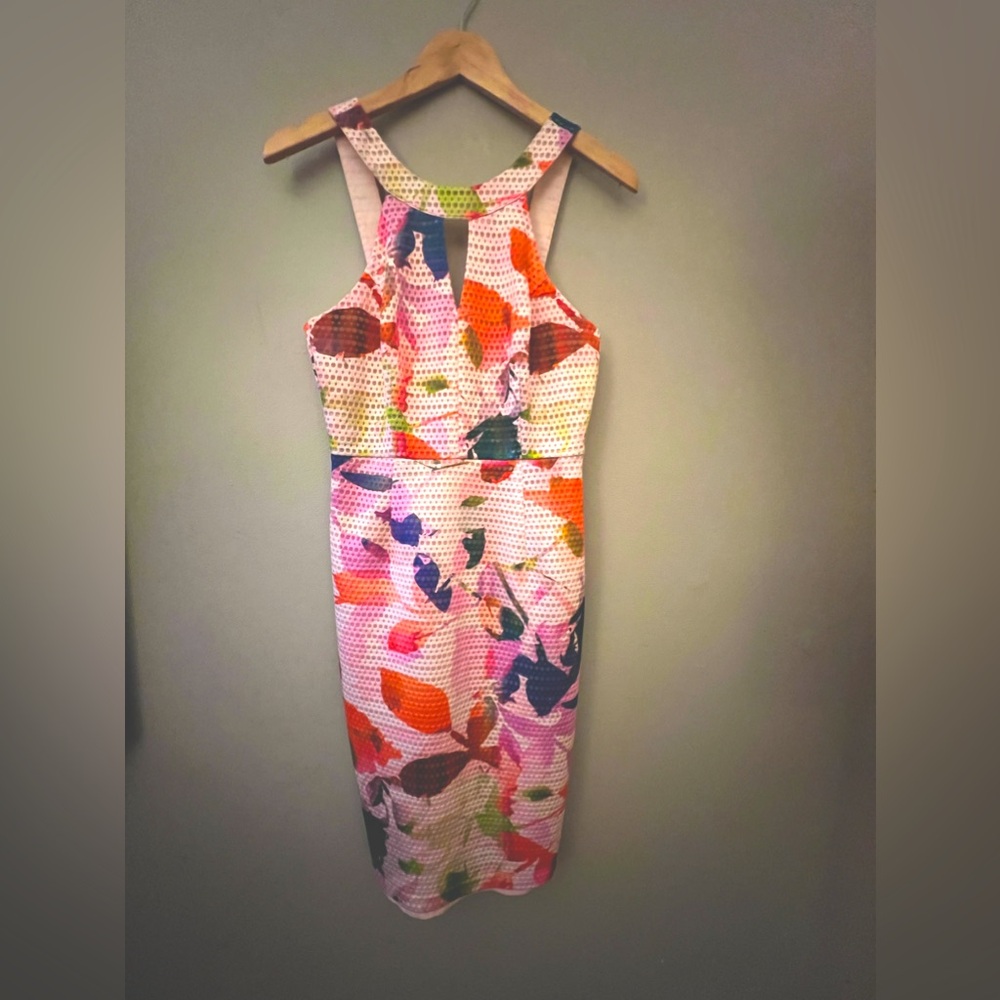 Trina Turk Sylvia Keyhole Sheath Dress
NWT
Size S